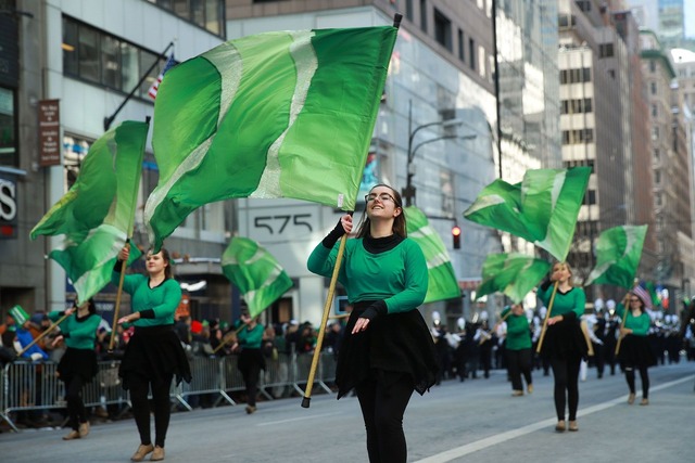Color-guard-twirls-flags-St-Patr