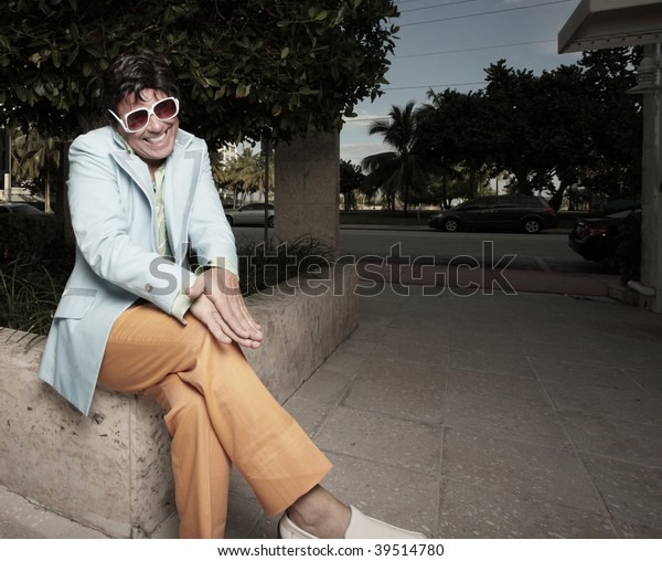man-sitting-his-legs-crossed-600