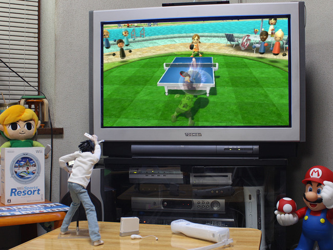 「Wii Fit」で体重計に乗って、「Wii Sports Club」で楽しく遊んでた人達