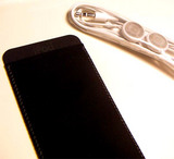 Apple's included iPod sleeves go from gray to black