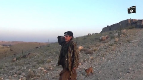 サルを連れている謎のジハード戦士