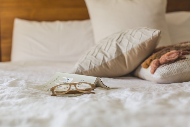 eyeglasses-with-brown-frames-on-white-textile-545026