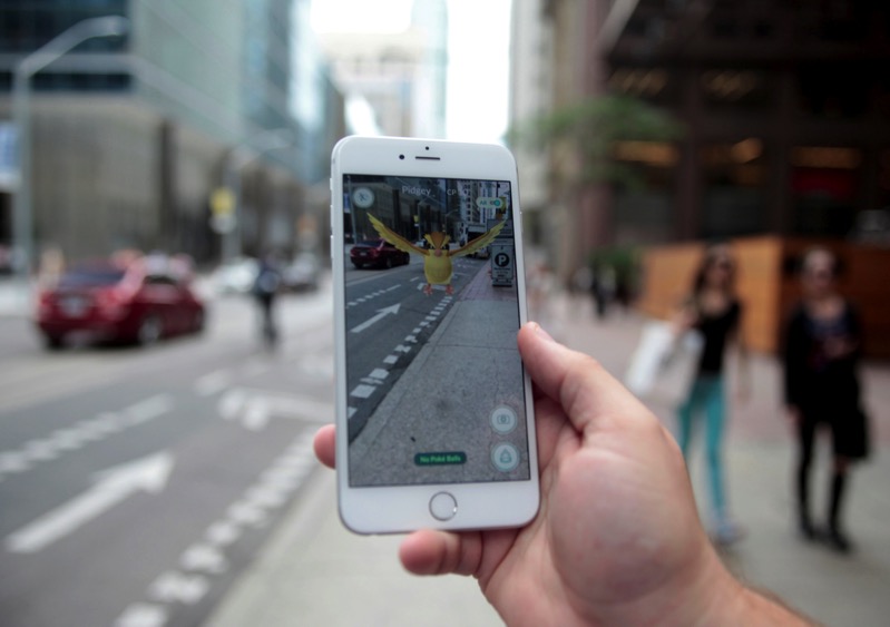 canada_pokemon_on_screen_of_pokemon_go_mobile_app_in_downtown_toronto_ontario_canada_rtsifpt.jpg Canada pokemon on screen of pokemon go mobile app in downtown toronto ontario canada rtsifpt