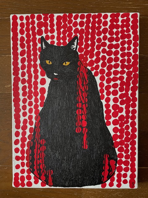 赤い簾と黒猫