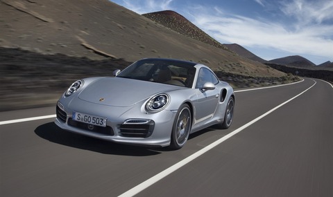 silver-2013-porsche-911-turbo-motion-front-angle-view-preview