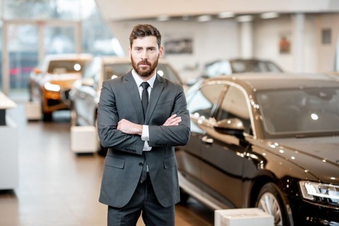 dealer-salesman-standing-1000x668