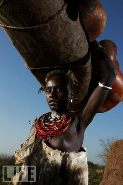 Dassanech Woman With Her Worldly Belongings