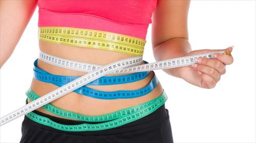 fit-woman-with-a-tape-1515605090Pm4_R
