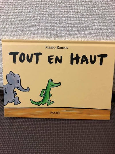 TOUT EN HAUT