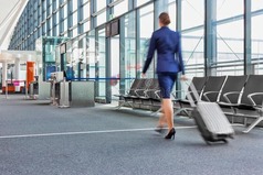 flight-attendant-walking-airport