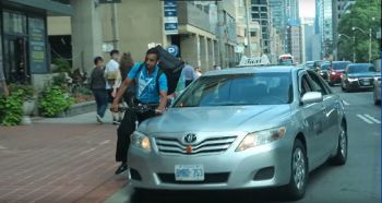 taxi hitting cyclist