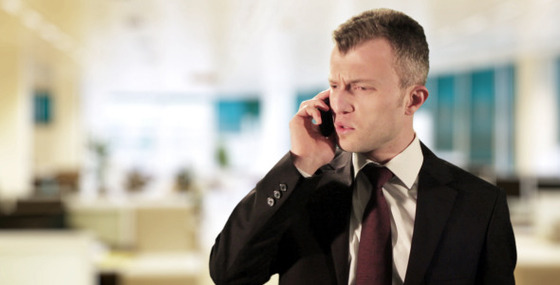 Angry Business Man Telephone Call - 590 x 300