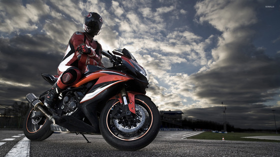 riding-a-black-and-red-motorcycle-47481-1920x1080