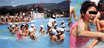 女性の首を絞める手