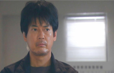 取調べを見つめる