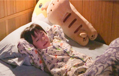 咳をしている少年