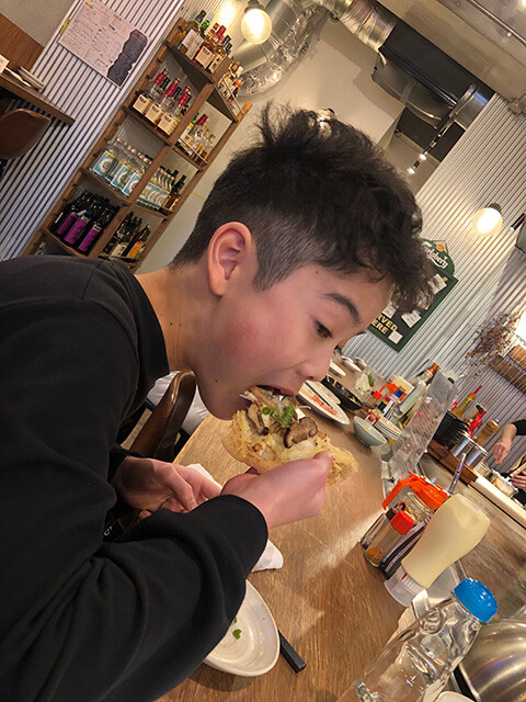 Kenshiro Eating Japanese Pizza with Rich Mushrooms