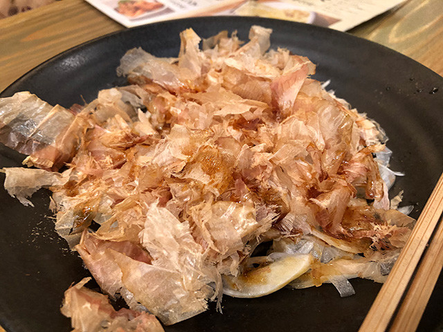 Sliced Onion with Dried Bonito Flakes and Egg Yolk