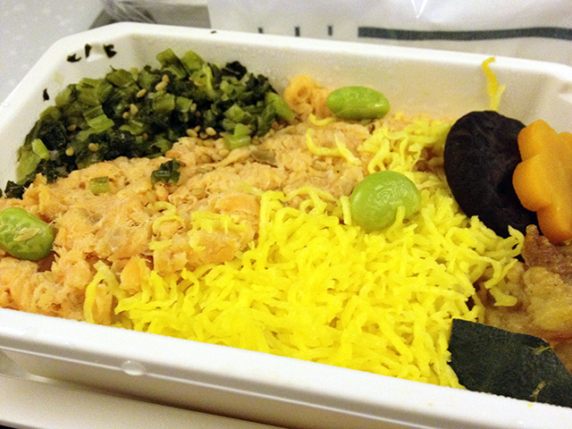 Salmon Flakes and Various Ingredients on Steamed Rice