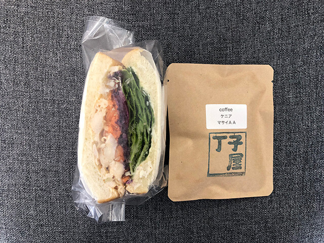 Chicken and Vegetable Sandwich and Coffee