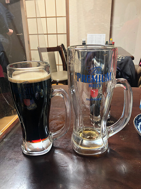 Medium and Large Black Beer