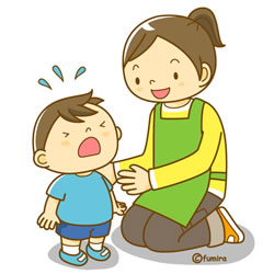泣いている子どもと先生