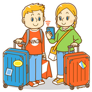 スーツケースを持つ欧米からの旅行者