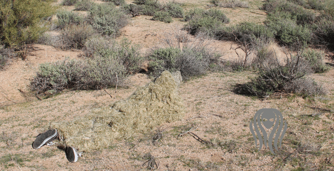 ghost-ghillie-suit-dry-grass-on-ground