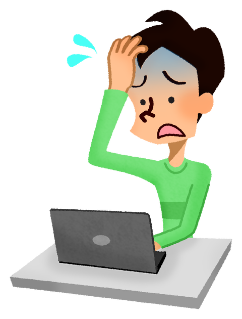 PC前で焦る男