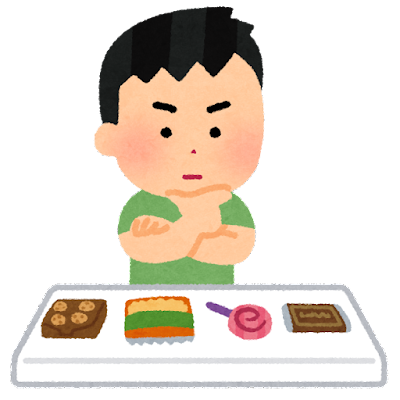 お菓子を選ぶ男