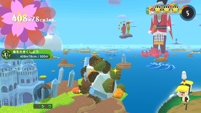 巨大な城や大陸を巻き込みながら塊を大きくしている場面