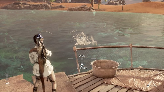 砂漠地域にあるオアシスにて釣りをしているイヴ