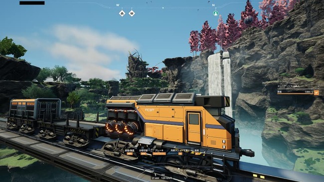 拠点から拠点へと繋げた線路上を移動する列車を操作している場面