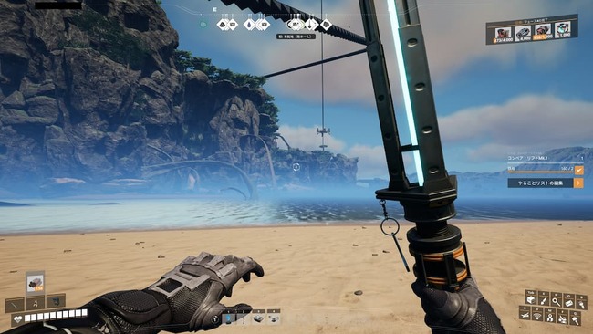 断崖絶壁と砂浜が広がる海岸沿いを探索する主人公