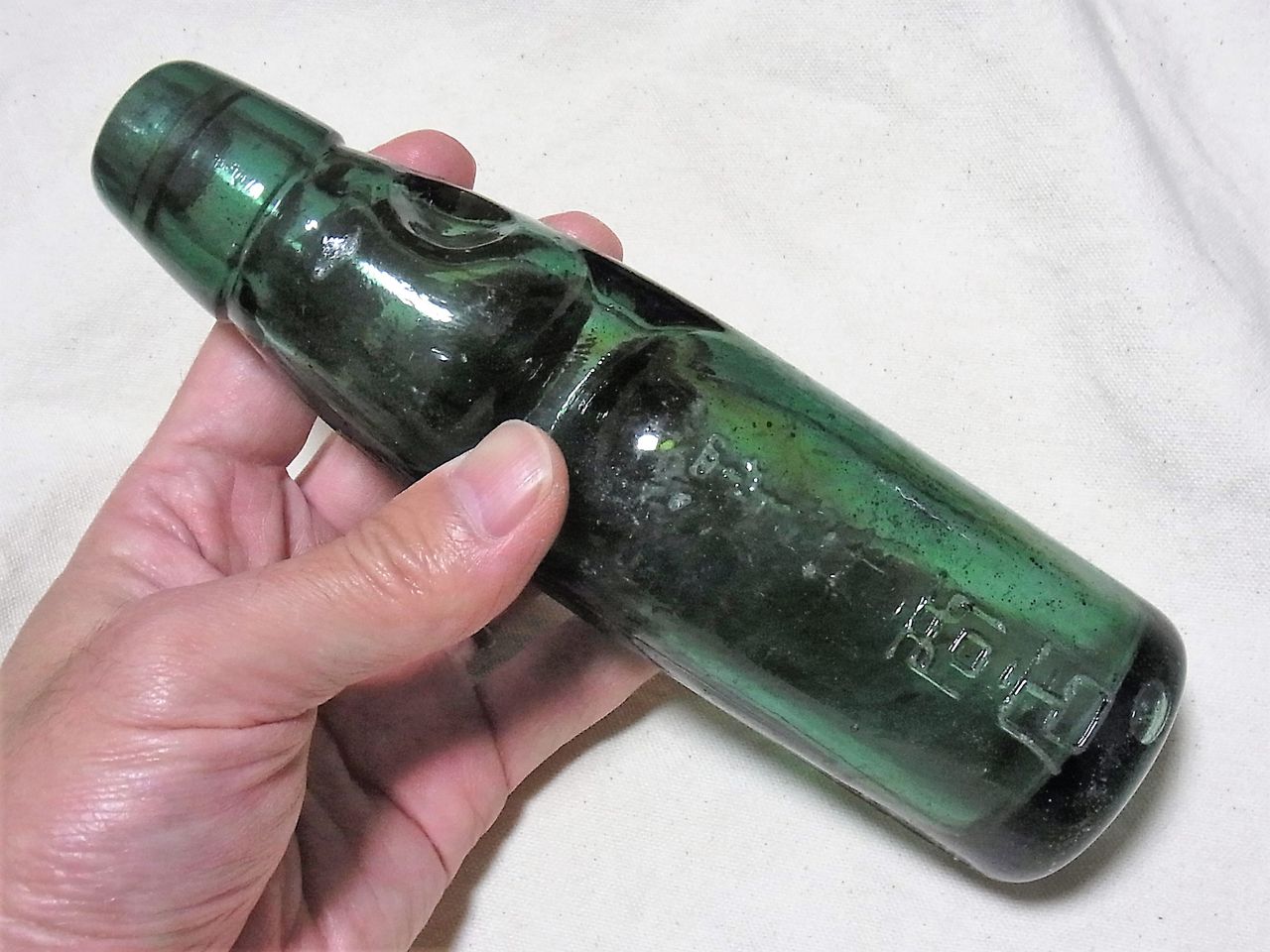 緑色のラムネ瓶は語る 澤井商店 エンボス瓶 サルナシの掘り掘り日記 越後黄金山の砂金を訪ねて