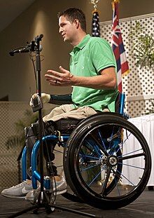 220px-Brian_Kolfage_keynote_at_Navy_League_Sea_Service_Awards