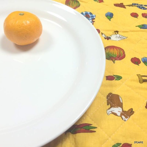 ランチョンマットとみかん