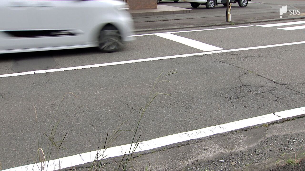 北海道での白バイ警官死亡事故、運転手が予見の限界を主張