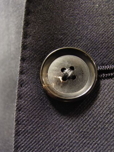 仕立て服のボタン