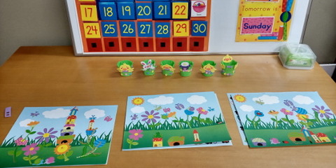 sticker and egg stand on the table