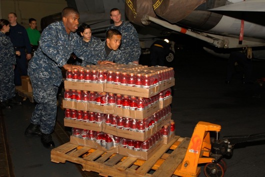 75572-sailors-unload-cases-of-drinks-and-water
