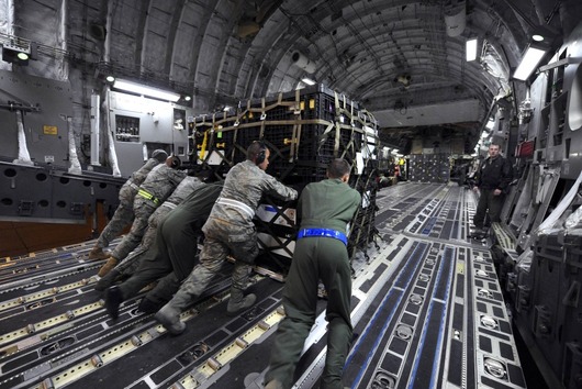 75568-airmen-load-supplies-in-california-for-japan