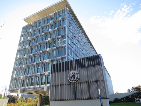 1200px-WHO_HQ_main_building,_Geneva,_from_North