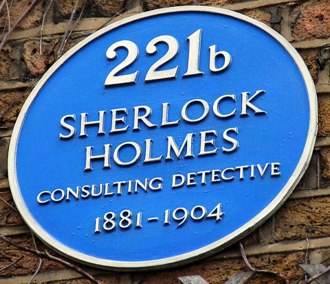 800px-Sign_at_Sherlock_Holmes_Museum_in_Baker_St_221b