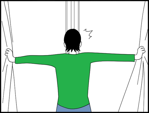 カーテンを閉めるホリー