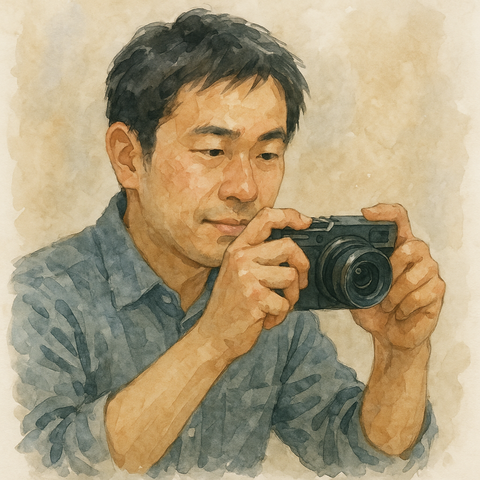 デジカメで写真を撮る男性