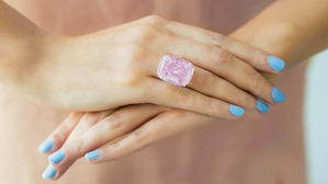 30ct Fancy Intense Pink on fingers
