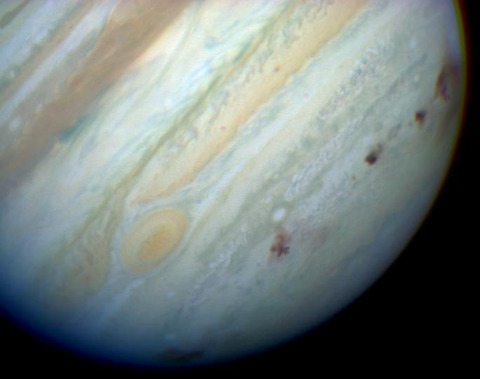 Jupiter_showing_SL9_impact_sites