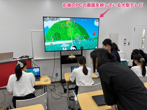 風船割りアプリに視線で入力する院生