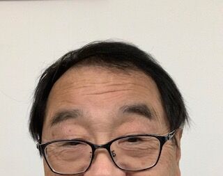 髪